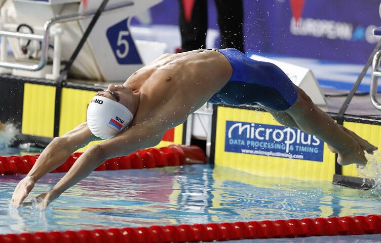 Евгений Рылов завоевал золото, в эстафете у российских пловцов — бронза Евгений Рылов завоевал золото, в эстафете у российских пловцов — бронза