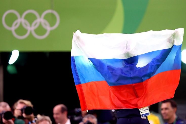 МОК назвал критерии снятия запрета на флаг России на церемонии закрытия Олимпиалы-2018