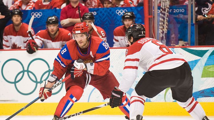 Впервые Олимпиада с НХЛ без России. А как было с ней?
