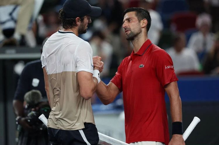 Валентен Вашеро и Новак Джокович. Фото ATP